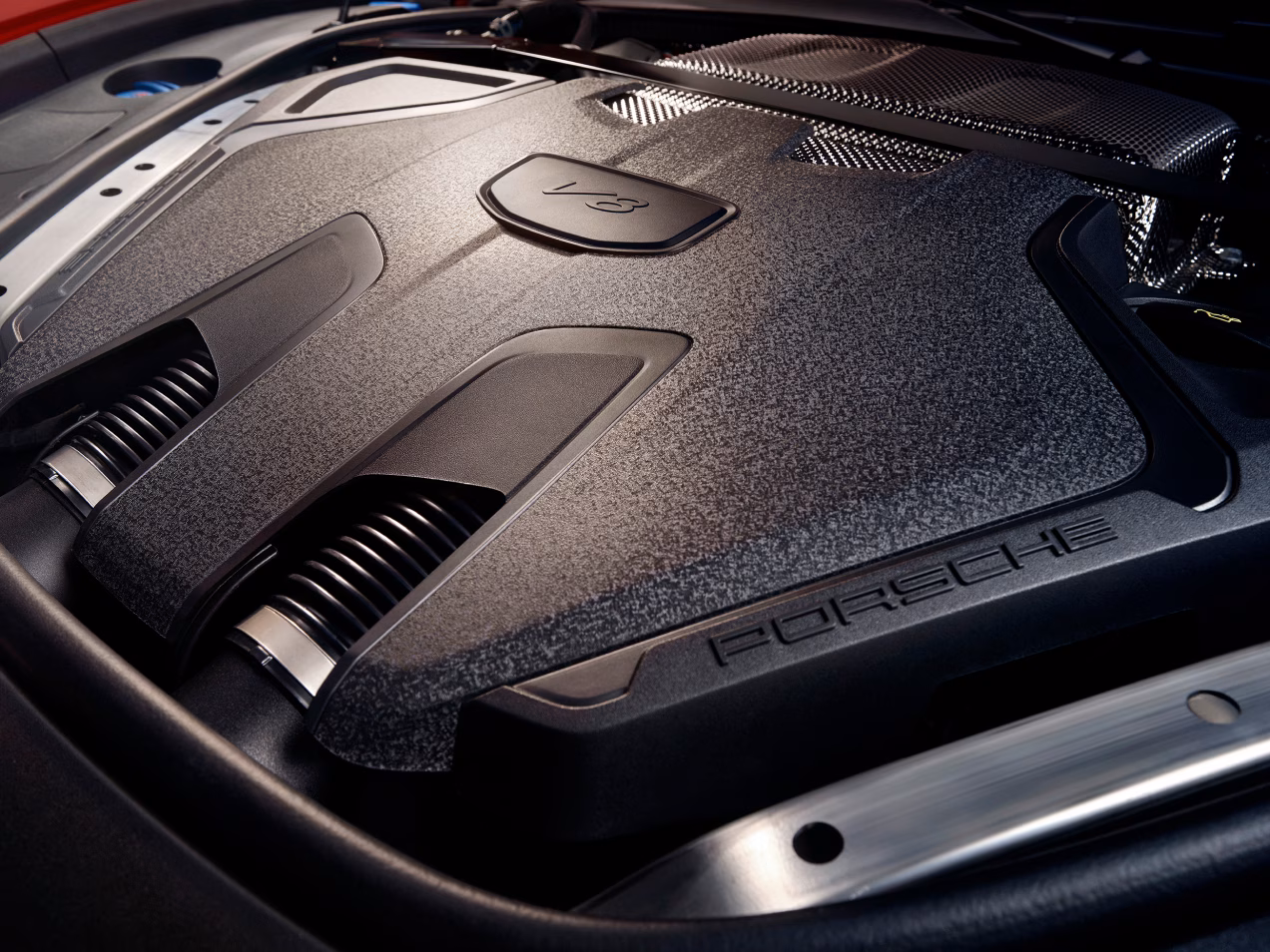 Detailed view of the engine cover of the Porsche Panamera GTS.