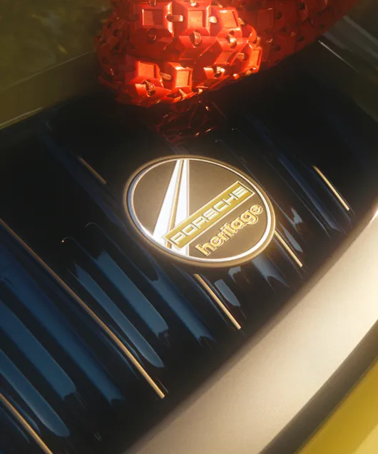 Detailed view of the Heritage Design badge on the vanes of the rear grille of the Porsche 911 Spirit 70.