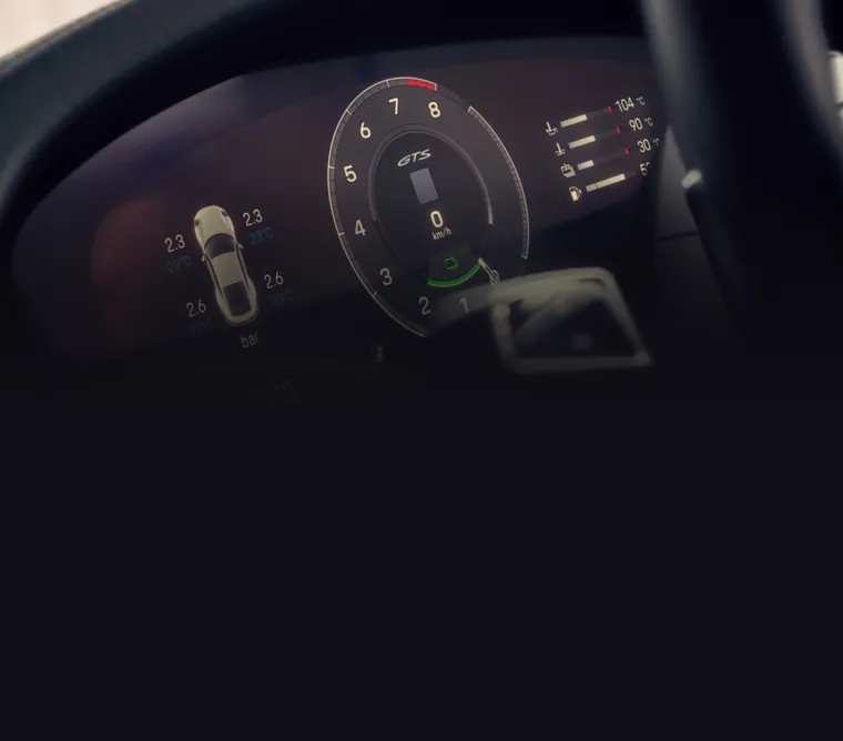 Interior of the Porsche 911 Carrera GTS Cabriolet. View of the instrument cluster or curved display.