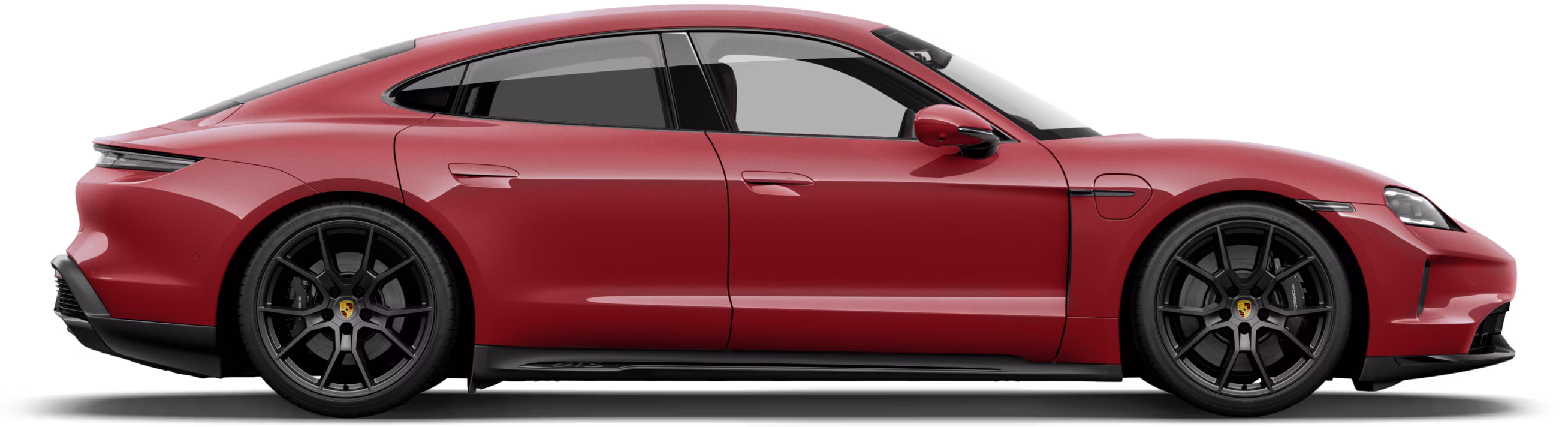 Porsche Taycan in Shadegreenmetallic in profile / side view.