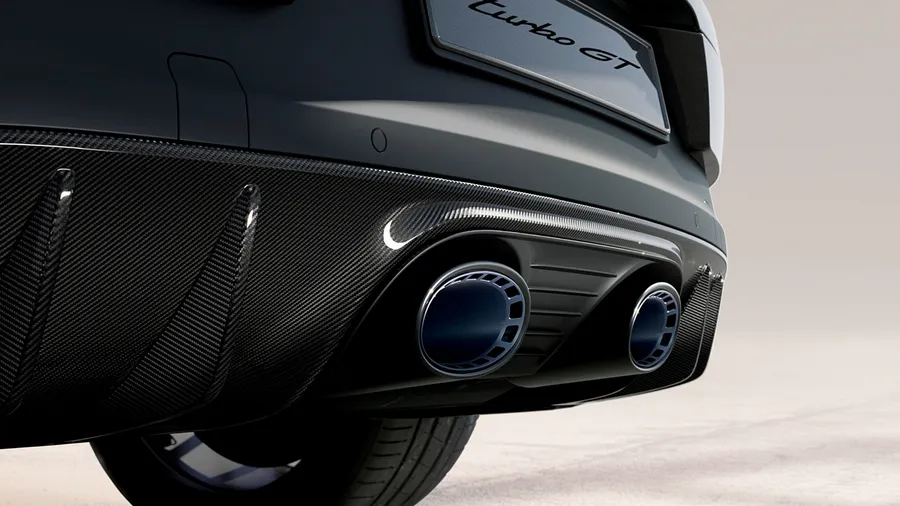 Porsche Cayenne Turbo GT in Quartzite Grey Metallic: detailed view of the exhaust system and rear diffuser in carbon.