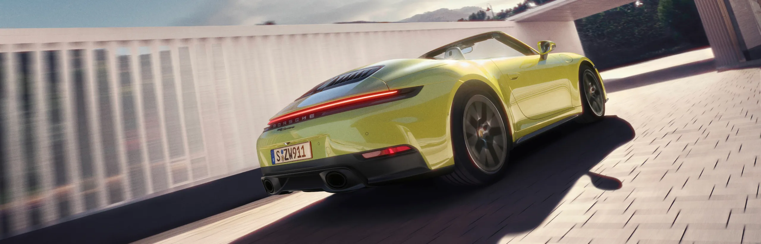 红色车顶的黑色保时捷 911 Carrera GTS Cabriolet 穿梭于城市中前侧视图