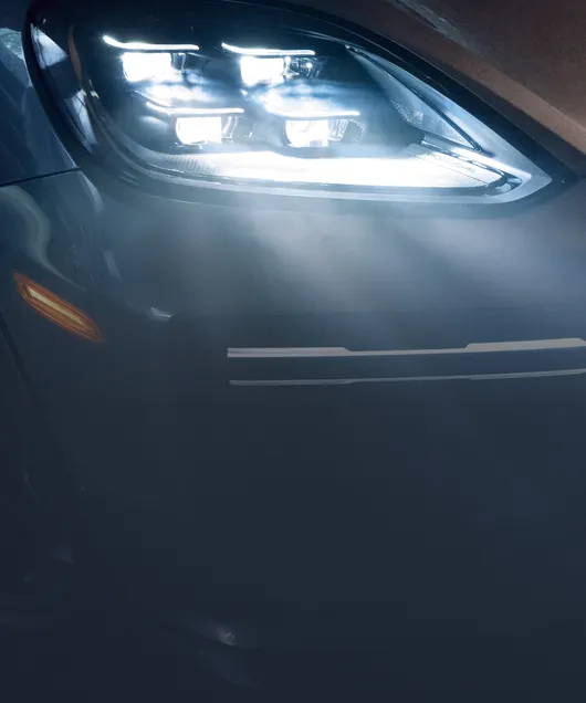 Porsche Cayenne Turbo GT in Quarzite Grey Metallic. Detailed view of the HD matrix LED headlamps.