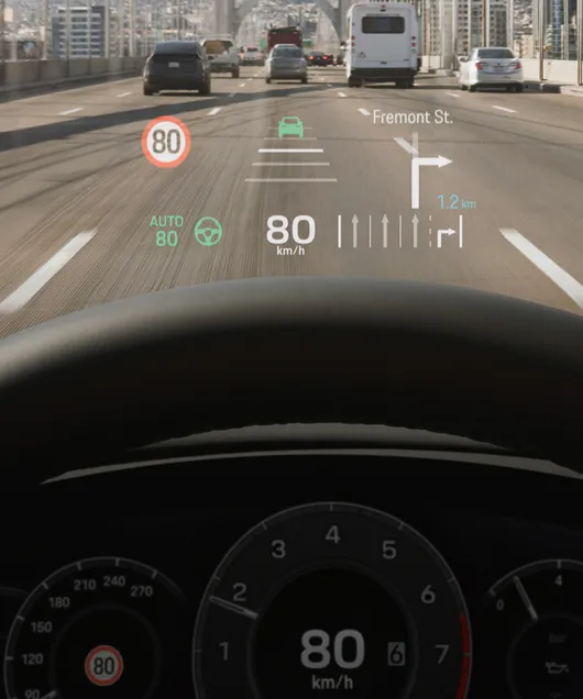 Porsche Cayenne interior: detailed view of the head-up display while driving.