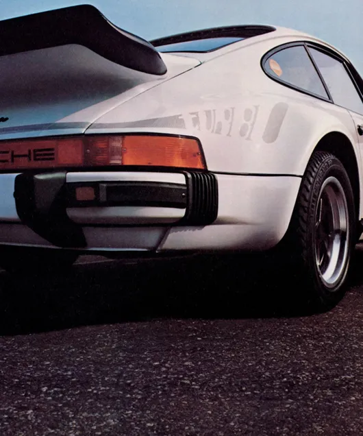 Porsche 911 Turbo shown from behind.