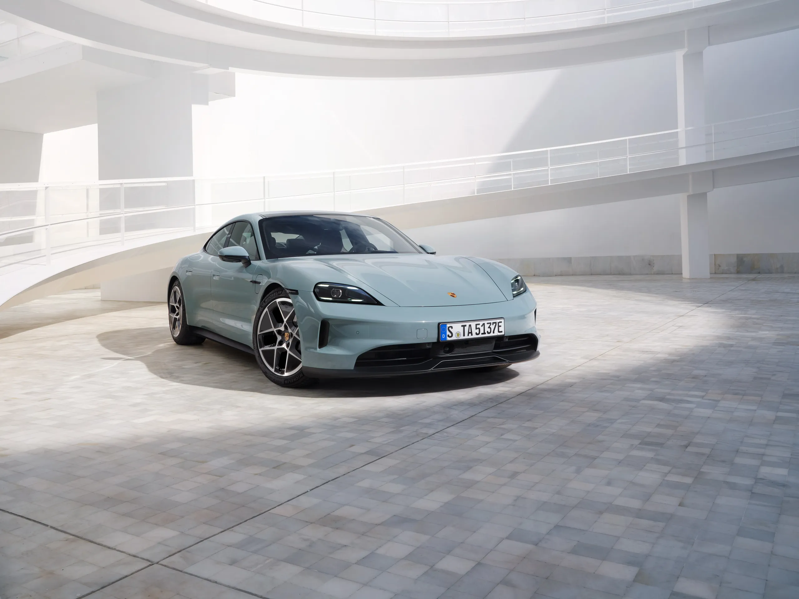 Static Porsche Taycan sedan.